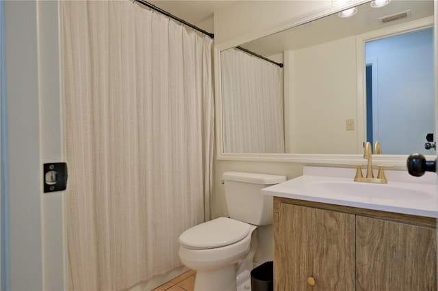 full bathroom with visible vents, toilet, vanity, a shower with curtain, and tile patterned floors