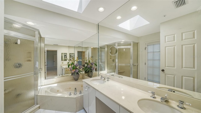 full bathroom with a jetted tub, a sink, visible vents, and a shower stall