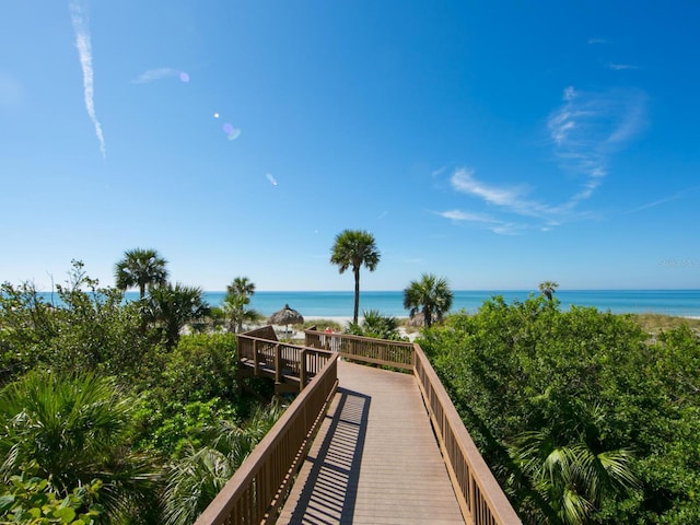 surrounding community featuring a water view