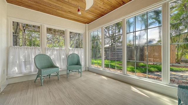 sunroom with wood ceiling