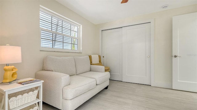 sitting room with light wood-style flooring