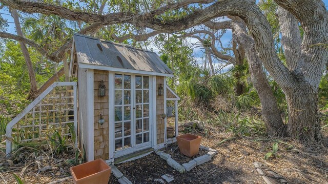 view of outbuilding featuring an outdoor structure