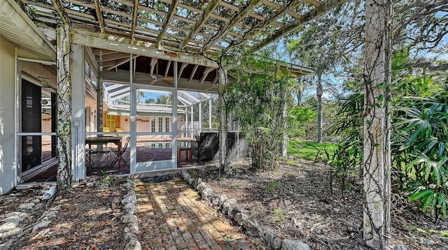 view of yard with a lanai and a pool