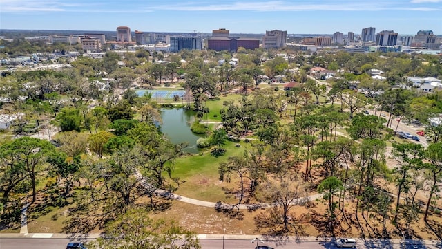 bird's eye view featuring a view of city and a water view