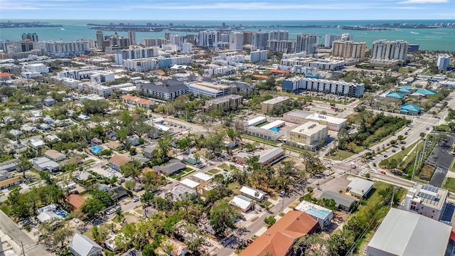 aerial view with a water view and a city view