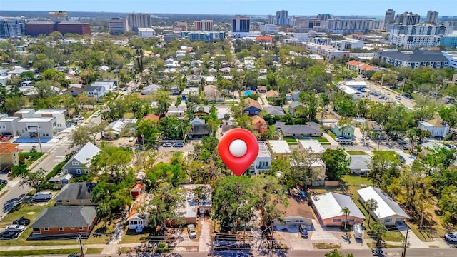 birds eye view of property featuring a view of city