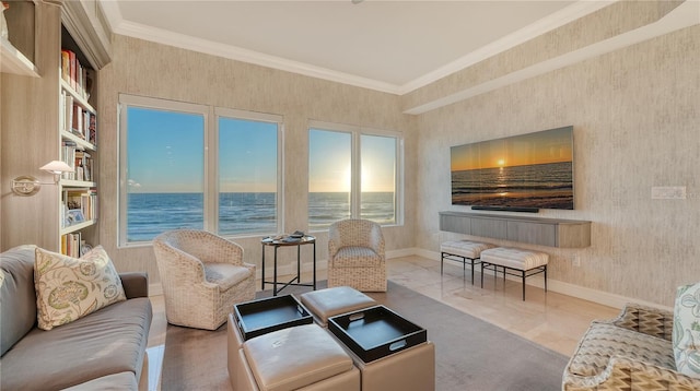 living area with crown molding and baseboards