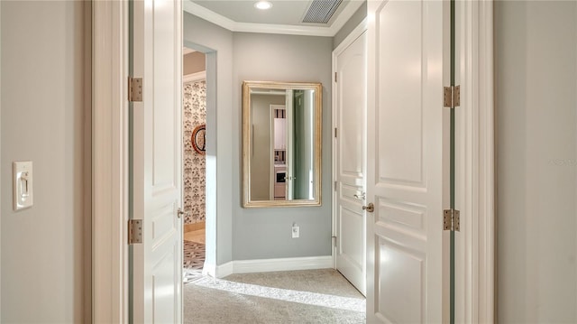 corridor featuring visible vents, recessed lighting, carpet, crown molding, and baseboards