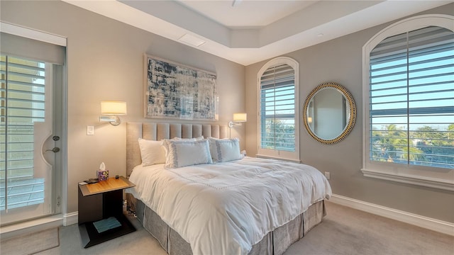 carpeted bedroom with baseboards