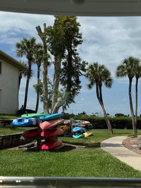 view of community featuring a yard