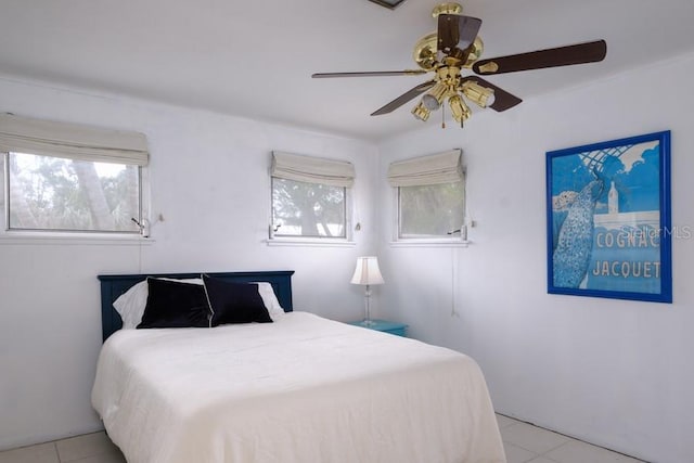 552 Juan Anasco Dr, Longboat Key, FL 34228 - bedroom featuring light tile patterned flooring and ceiling fan