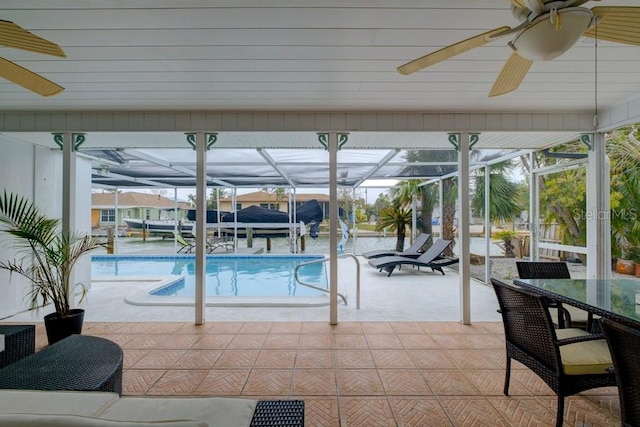 552 Juan Anasco Dr, Longboat Key, FL 34228 - swimming pool with ceiling fan, a patio area, and a lanai