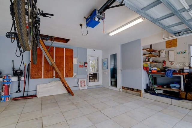 552 Juan Anasco Dr, Longboat Key, FL 34228 - garage featuring a garage door opener