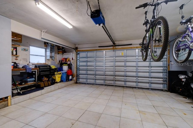 552 Juan Anasco Dr, Longboat Key, FL 34228 - garage featuring a garage door opener