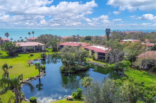 bird's eye view with a water view