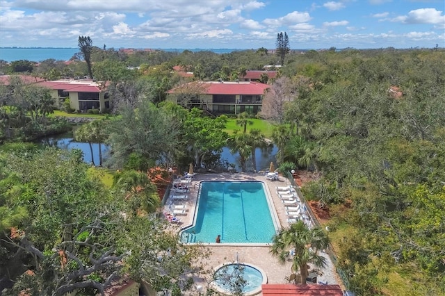 community pool with a water view