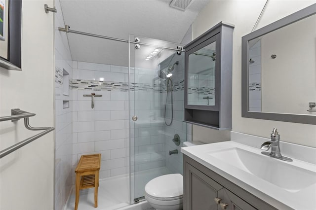 full bath with toilet, a stall shower, vanity, and visible vents