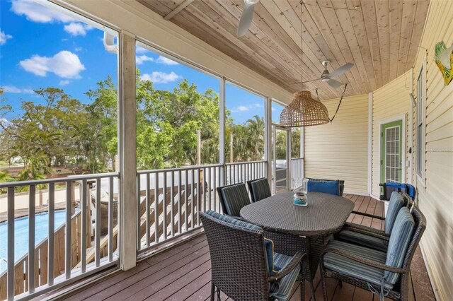 exterior space featuring wooden ceiling and ceiling fan