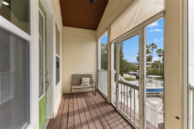 sunroom / solarium with wood ceiling