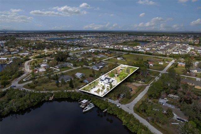 aerial view featuring a water view and a residential view