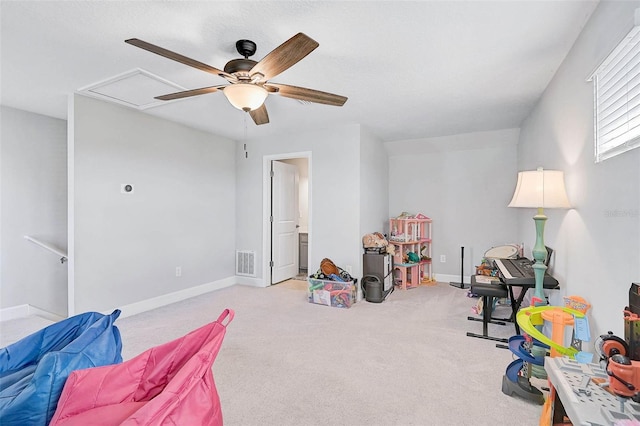 game room featuring ceiling fan, carpet flooring, visible vents, and baseboards