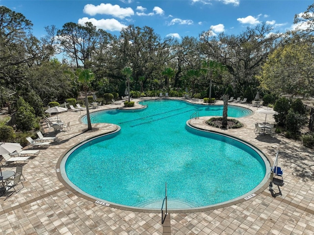 community pool featuring a patio