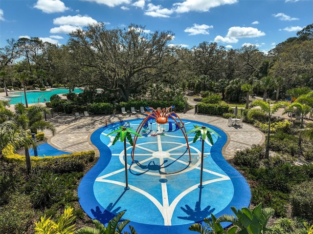 community pool featuring a patio