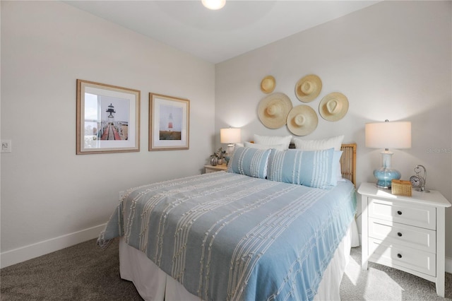 bedroom with carpet and baseboards