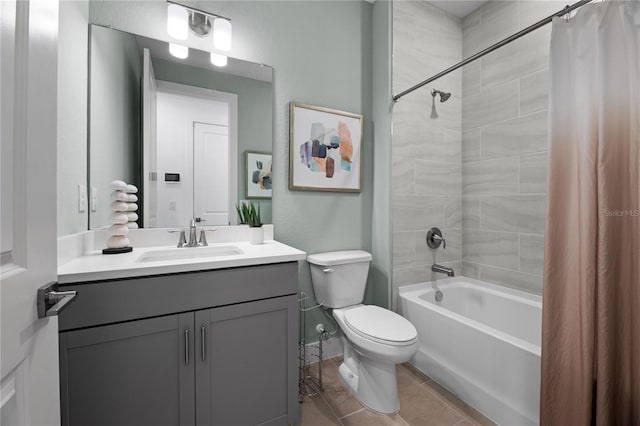 full bathroom featuring toilet, tile patterned floors, shower / bath combo, and vanity