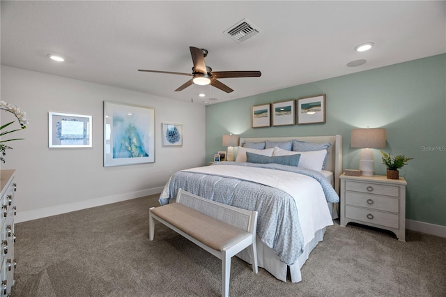 carpeted bedroom featuring ceiling fan, recessed lighting, visible vents, and baseboards