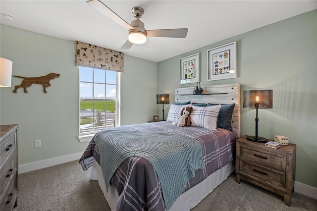 bedroom featuring ceiling fan, baseboards, and carpet flooring