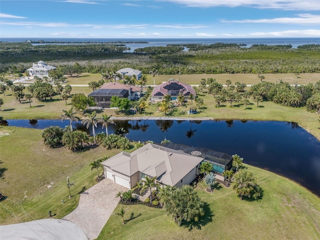 drone / aerial view with a water view