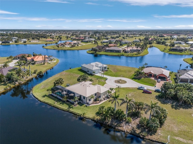 aerial view with a water view and a residential view