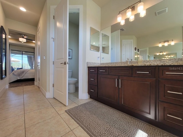 full bath featuring toilet, ensuite bath, tile patterned flooring, and visible vents