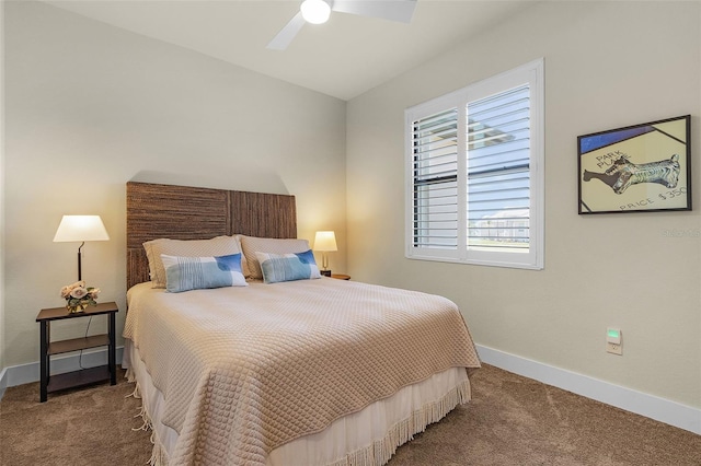 bedroom featuring carpet, baseboards, and a ceiling fan