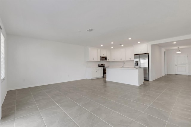 unfurnished living room featuring recessed lighting, visible vents, a sink, and light tile patterned floors