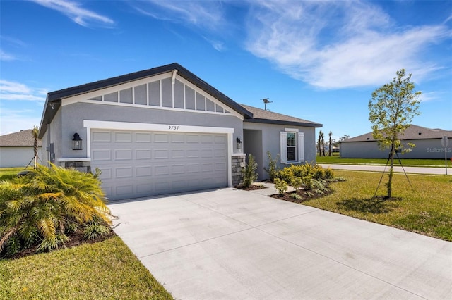 view of front of home featuring stucco siding, concrete driveway, a front yard, a garage, and stone siding