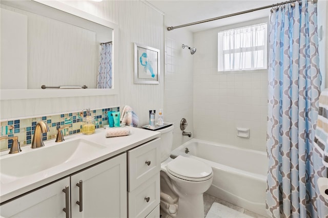 bathroom featuring toilet, backsplash, shower / bath combination with curtain, and vanity