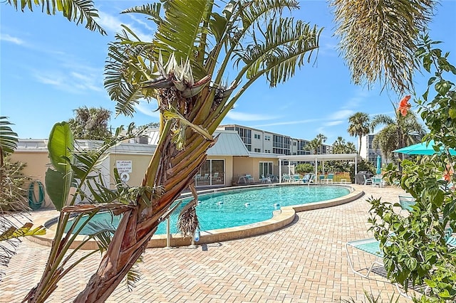 community pool featuring a patio