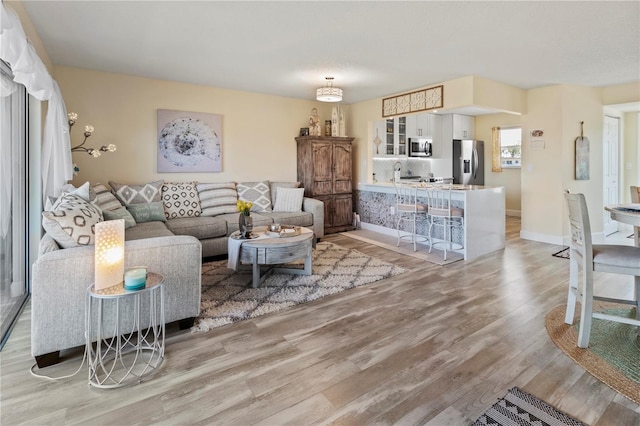 4240 Ironwood Cir Unit 302A, Bradenton, FL 34209 - living area with light wood finished floors and baseboards