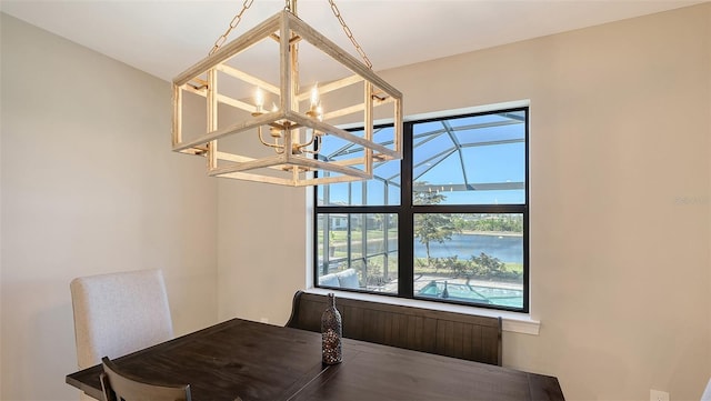 dining space featuring a chandelier