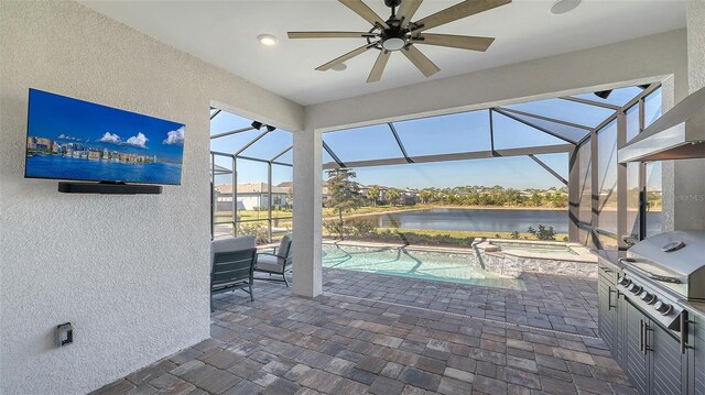 view of patio / terrace featuring a pool with connected hot tub, a water view, grilling area, ceiling fan, and a lanai