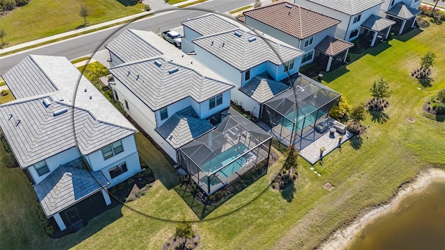 birds eye view of property with a residential view