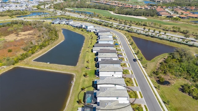 aerial view with a water view and a residential view