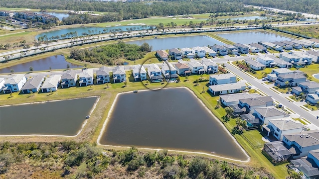 aerial view featuring a residential view and a water view