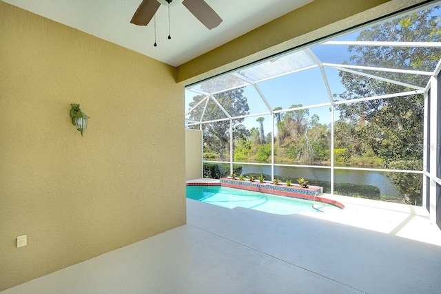 view of pool featuring a water view