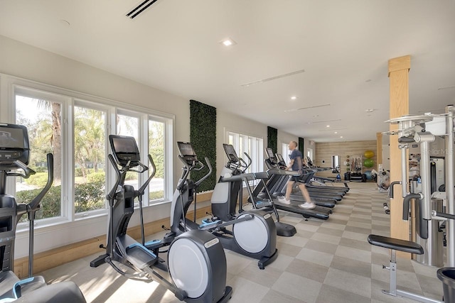 workout area with light floors, visible vents, and recessed lighting