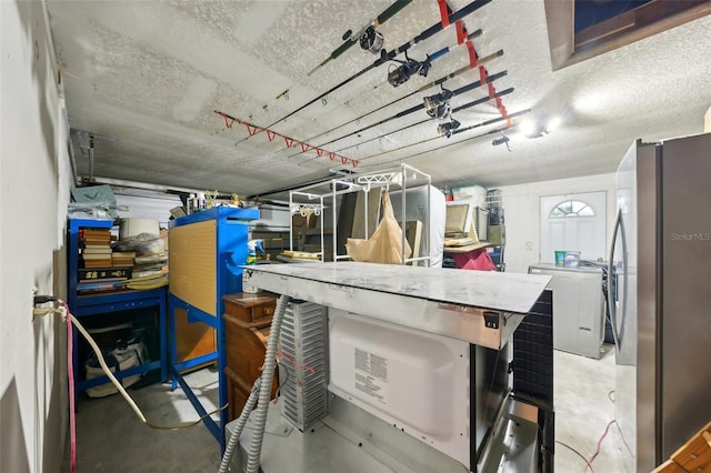 garage with freestanding refrigerator