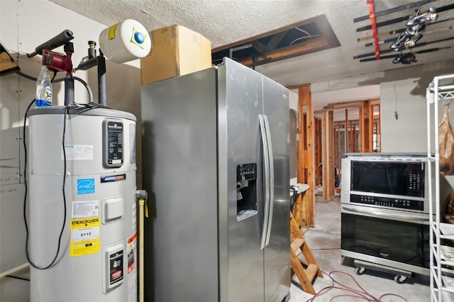 kitchen featuring a textured ceiling, hybrid water heater, stainless steel appliances, and concrete flooring