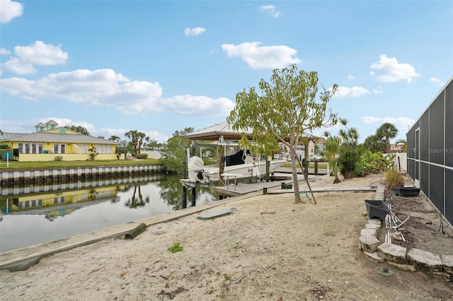 view of dock with a water view and boat lift